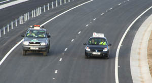 The drive, being filmed by the media (by P. Brooks)