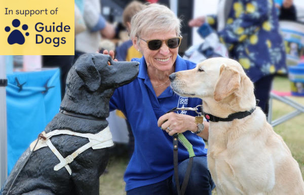 Picture of Lady and Guide Dog at Charity Event